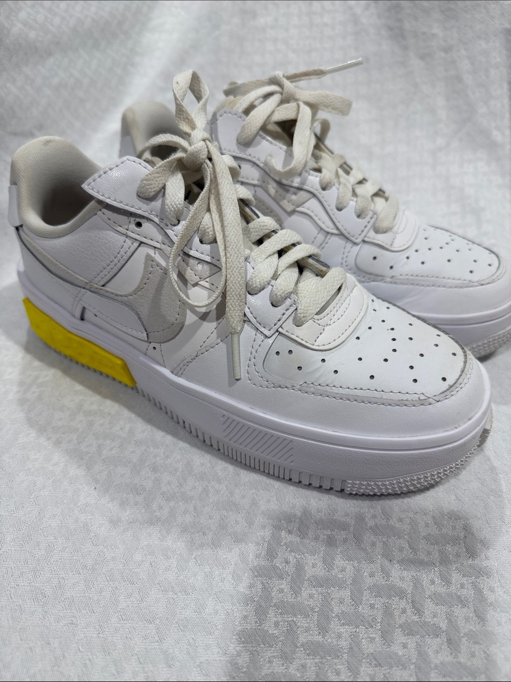 Nike White Leather Low-Top Sneakers with Yellow Heel Tab